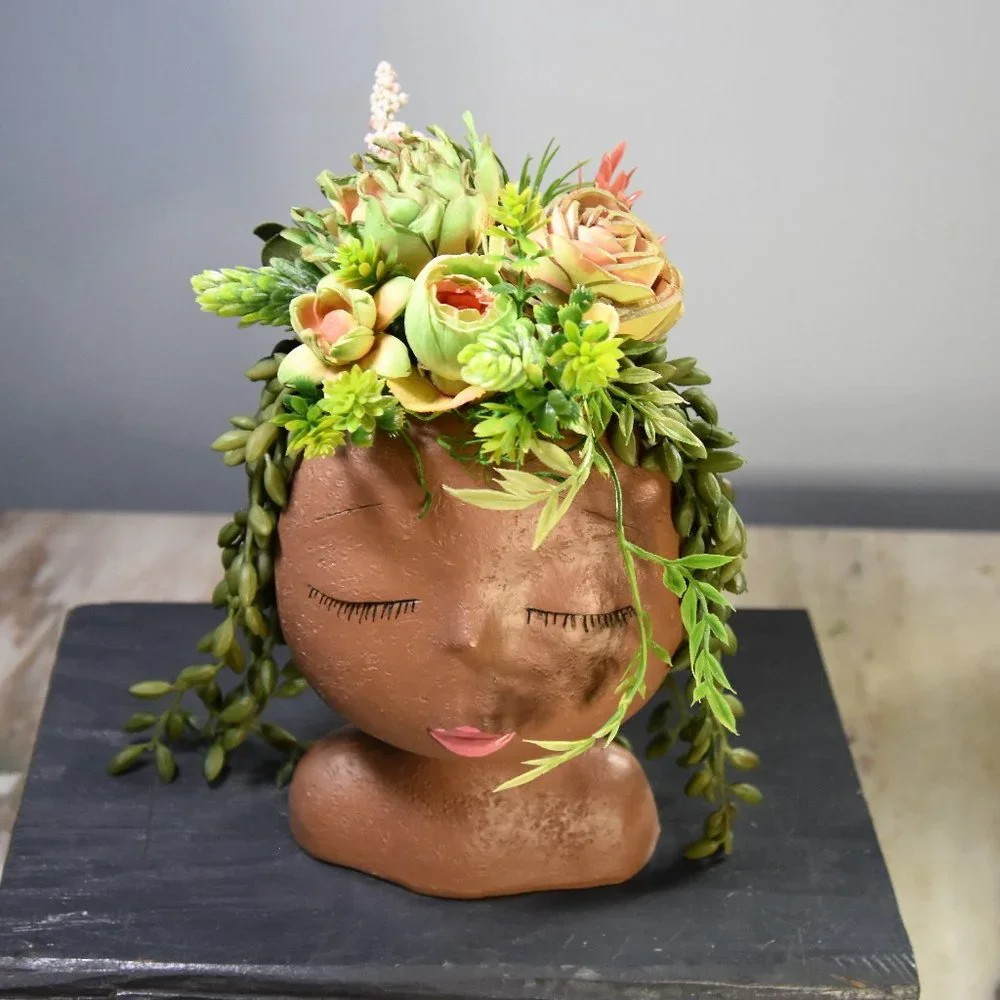 Serene, peaceful airbrushed Sola wood succulents in a fun fabulous face planter